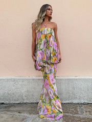 model wearing strapless pastel floral maxi dress outdoors