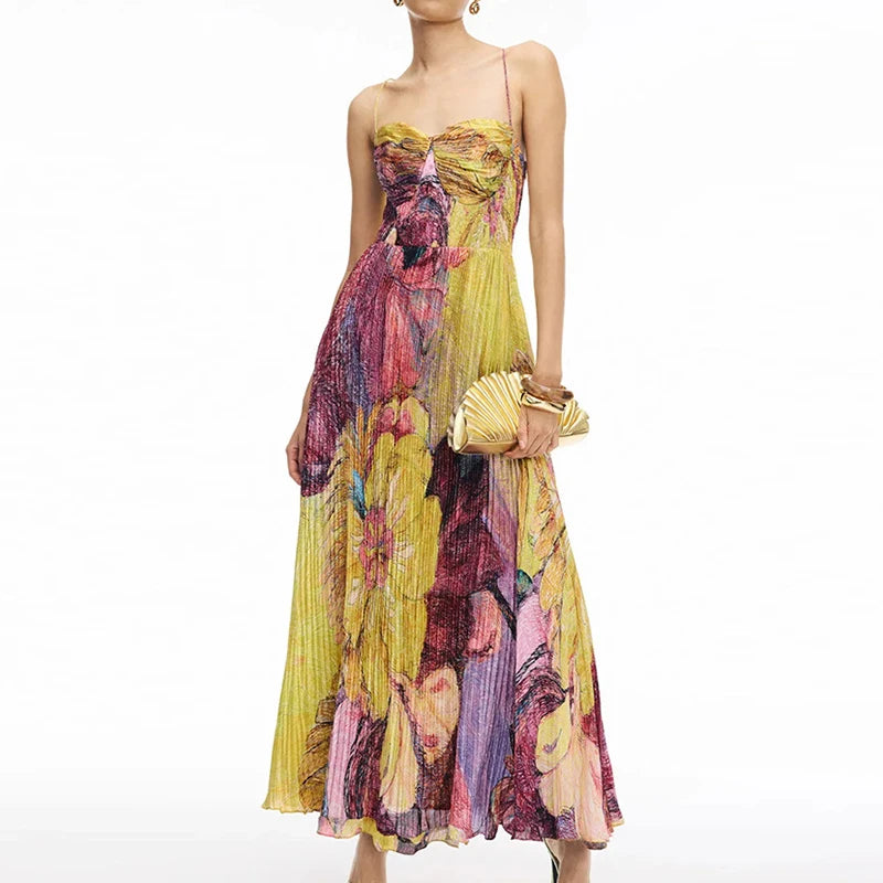 Front view of woman in strapless boho floral maxi dress with matching clutch