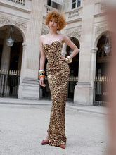 Strapless leopard print gown styled for dramatic evening parties