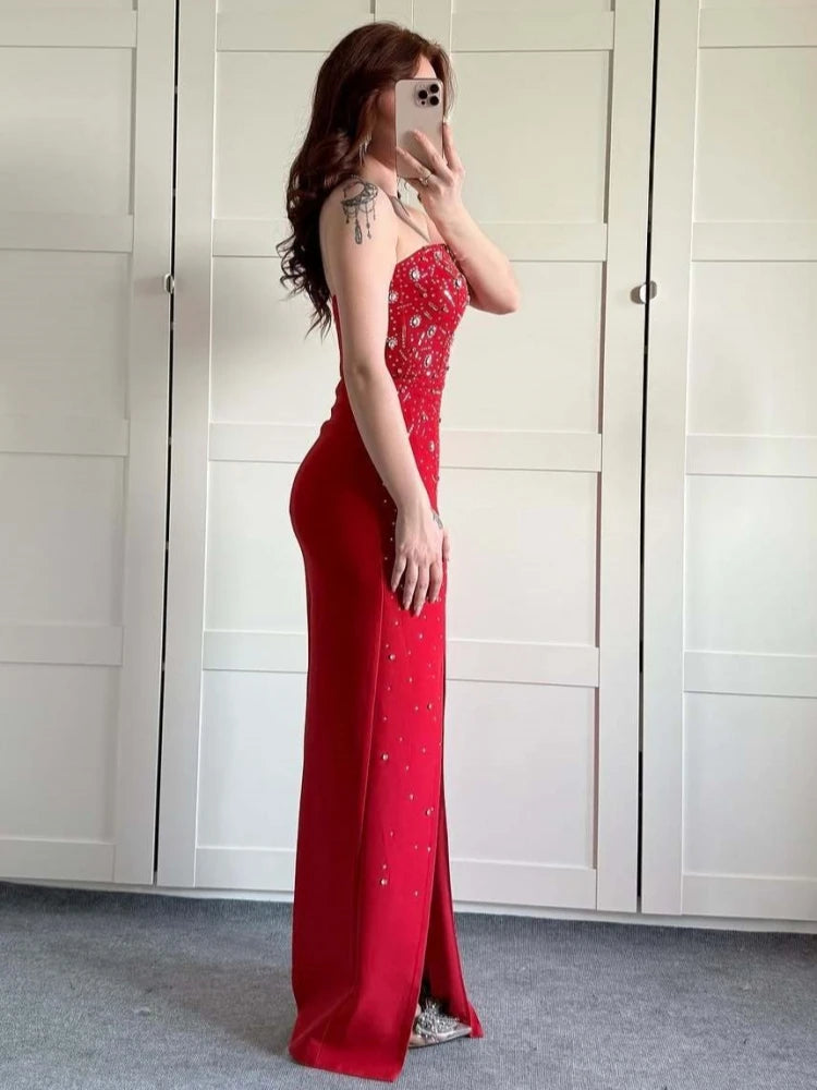 Strapless red gown with sparkling details shown as glam gala outfit