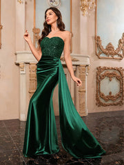 Slim draped pleated party gown with backless detail