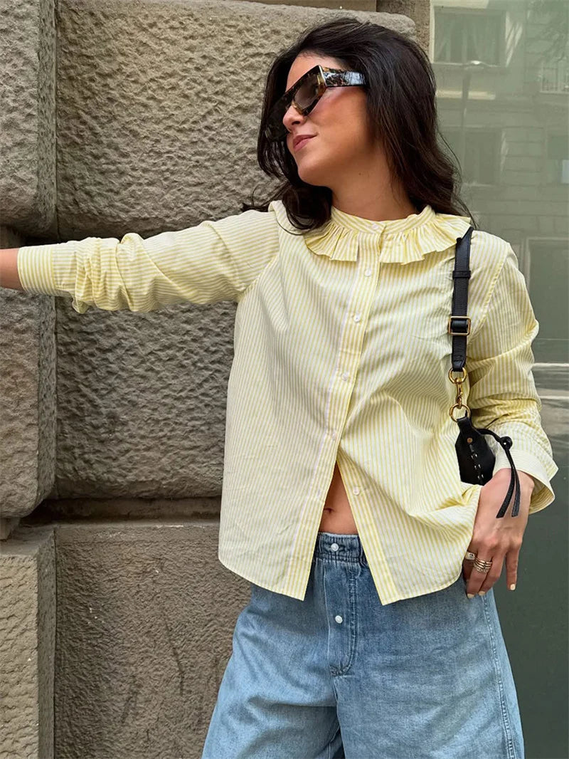 A front view of the striped patchwork shirt, showing the single-breasted detail.