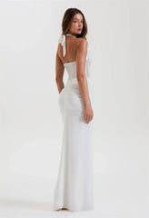 Structured white halter gown with corset seams for modern events