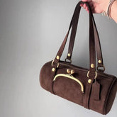 Boston shoulder bag with clip-buckle detail and studded straps