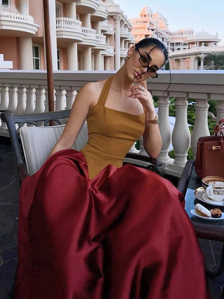 A long dress with a stylish patchwork design.