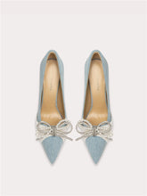Suede pointed toe pumps with pearl bow design
