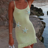 Tassel hem mini dress styled for summer beach days and city escapes