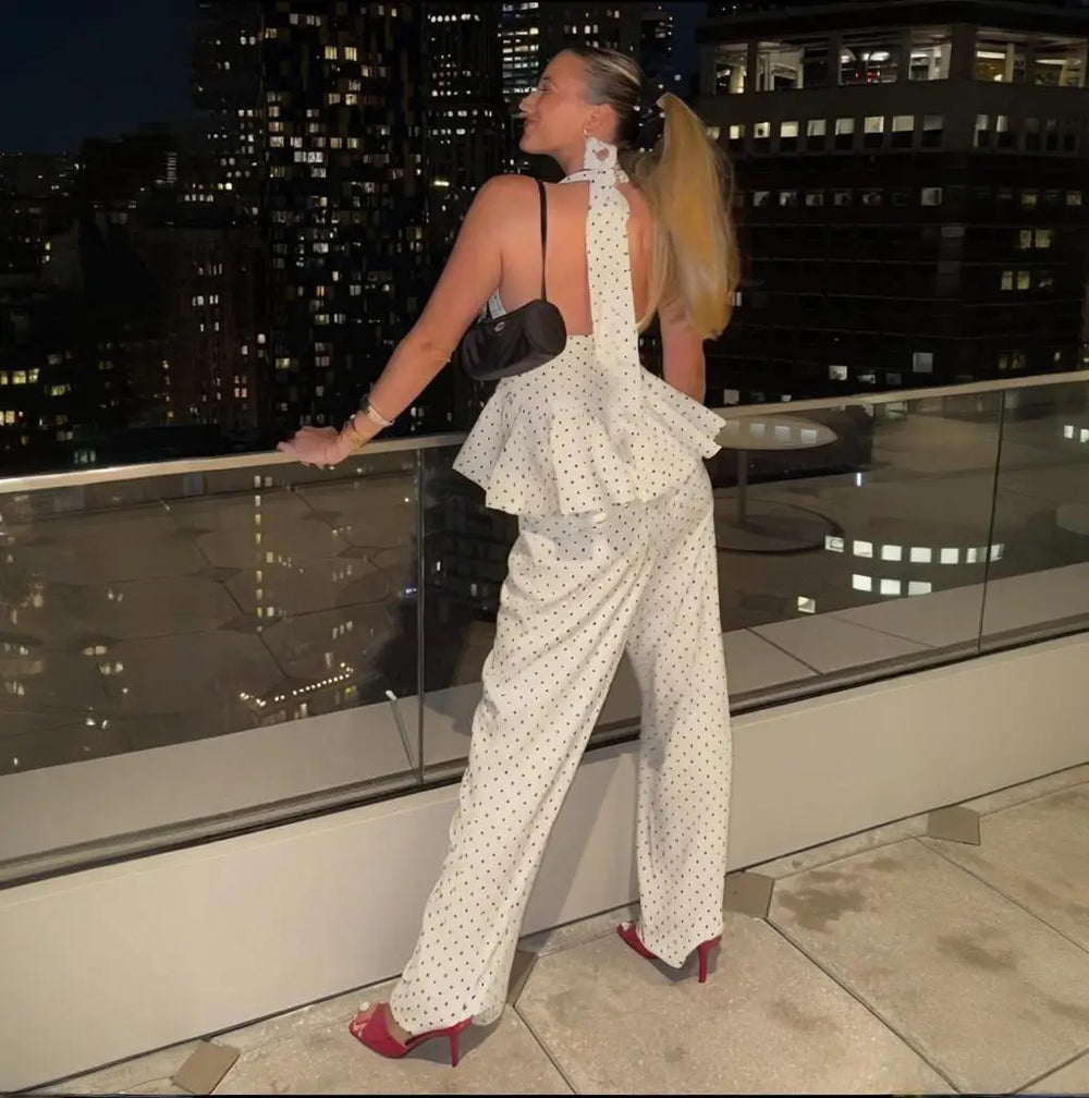 Resort-style outfit with halter top and wide-leg trousers