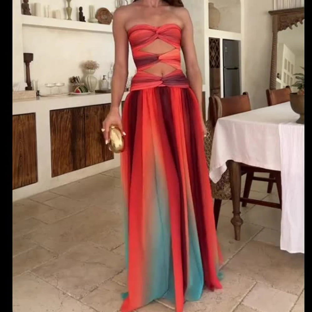 Flowing floor-length ombre dress styled indoors