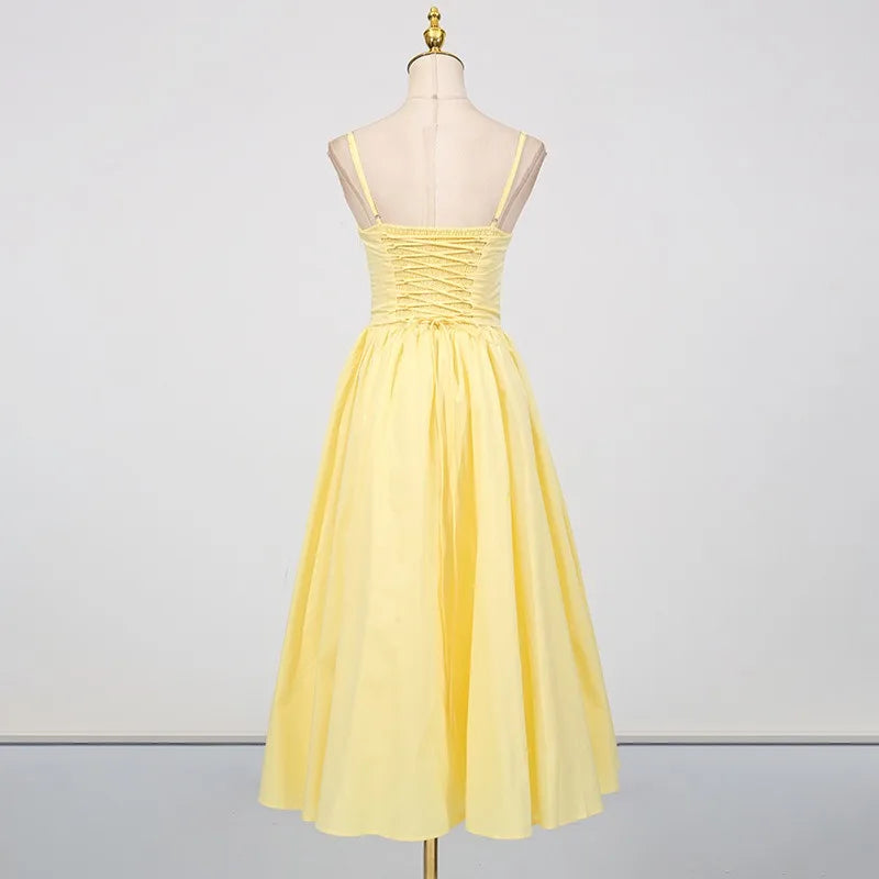 Summer yellow event dress perfect for celebrations and outdoor gatherings