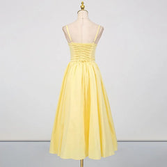 Summer yellow event dress perfect for celebrations and outdoor gatherings