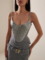 Detail of the thin cami straps and shimmering sequin surface, highlighting the structured bodice shape and clean neckline curve.