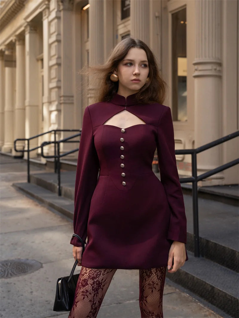Full-length view highlighting the structured silhouette, long sleeves, and refined tailoring of the blazer dress.