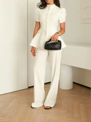 Tailored white blouse, modern power dressing for office and events