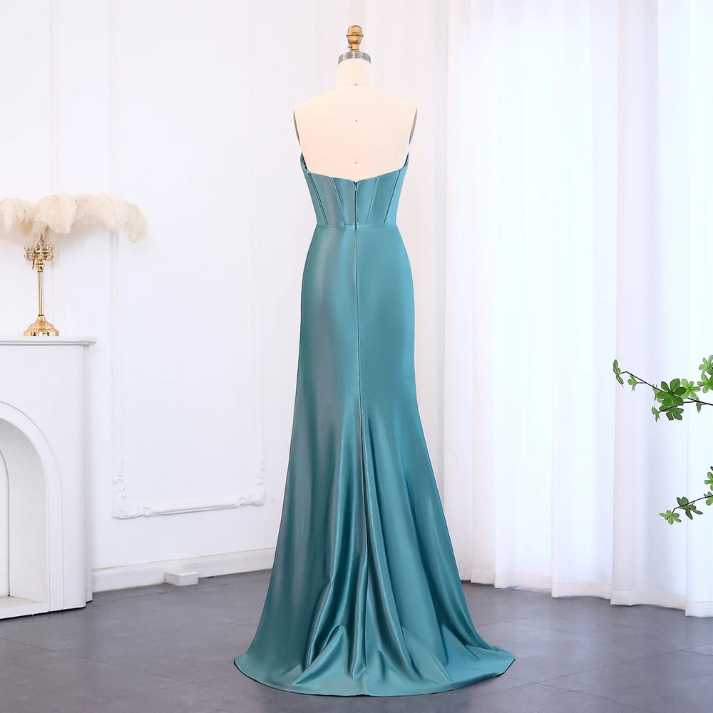 Backless detail on floor-length satin prom gown
