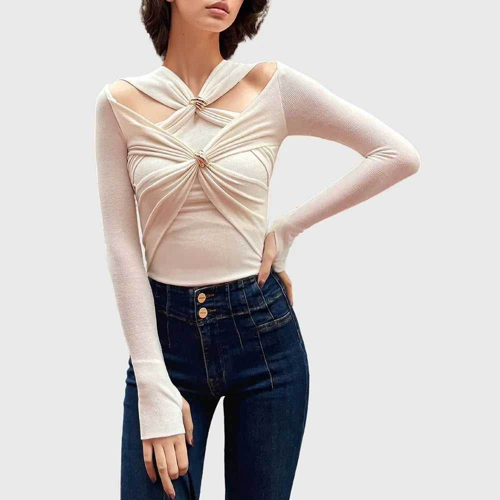 Twist front metal buckle long sleeve top styled with high rise jeans
