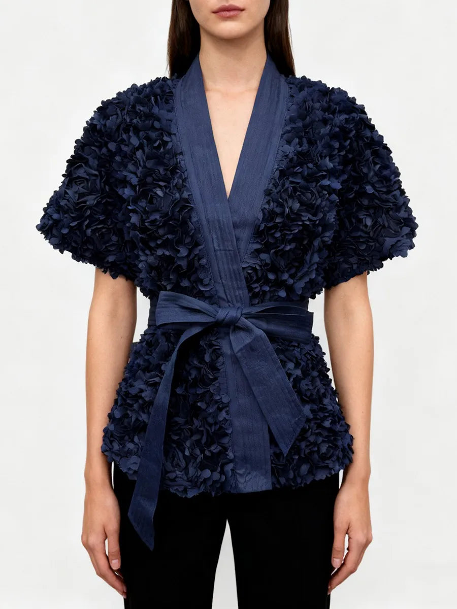 Textured outerwear top with adjustable belt