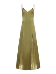 Close-up of V-neckline and lace detailing on green party dress