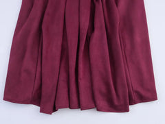 V-neck maroon velvet midi dress shown as a chic fall party look
