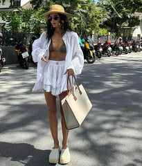 Vacation shirt and shorts resort outfit captured for casual holiday edits