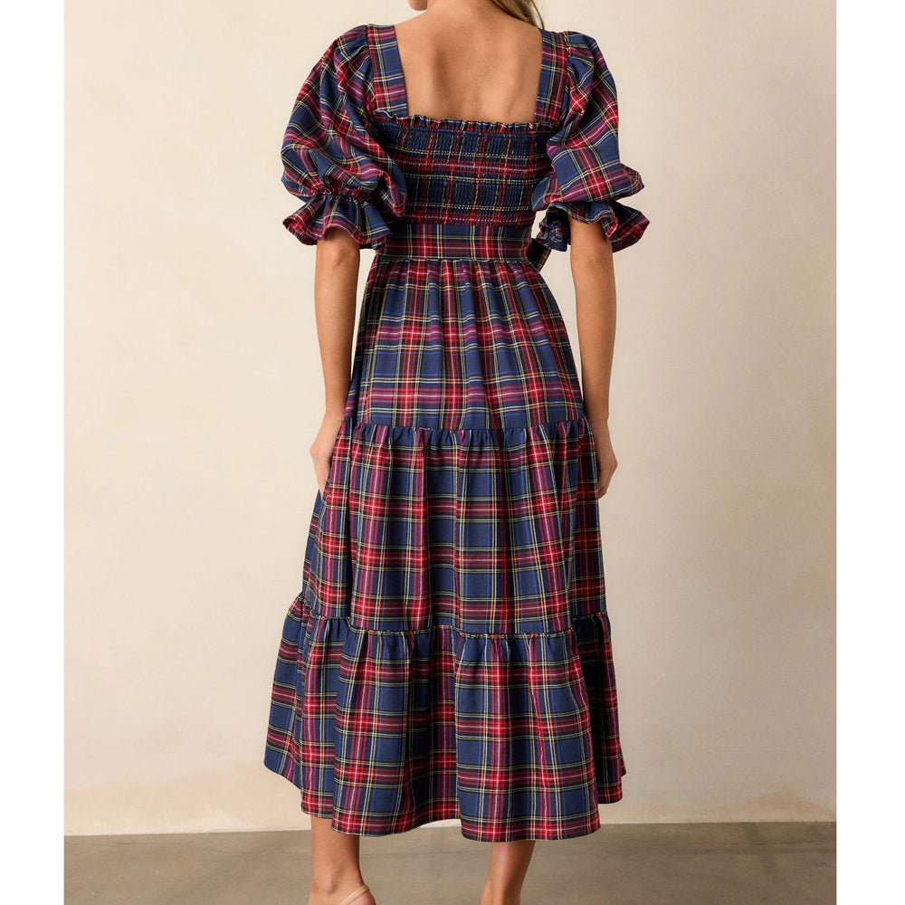 Close-up of plaid bodice with square neckline and puff sleeves