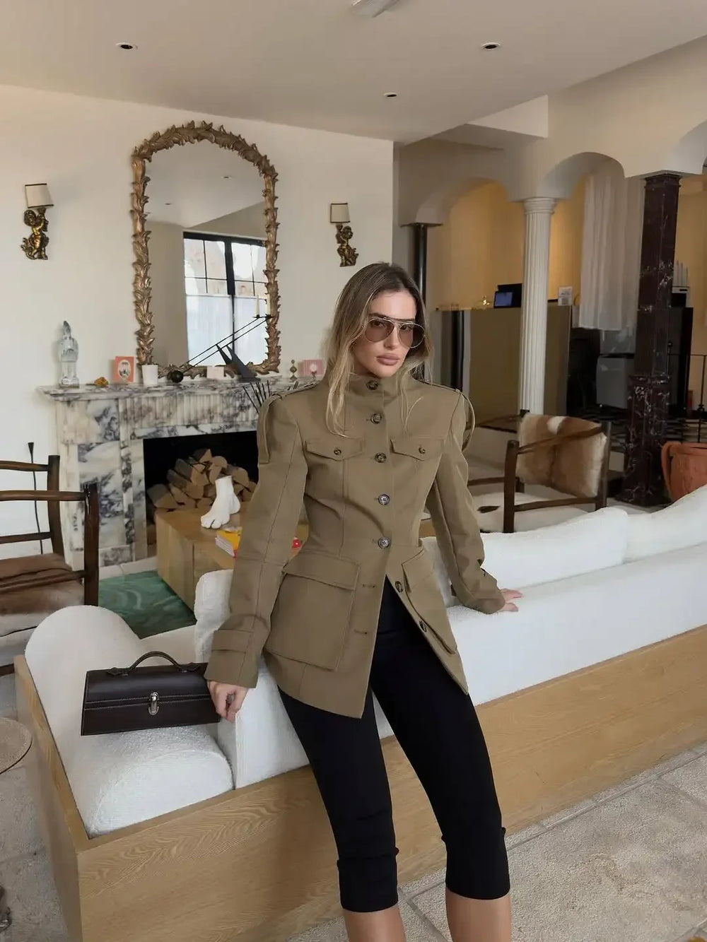 Waist-defined trench jacket styled as a polished everyday layer