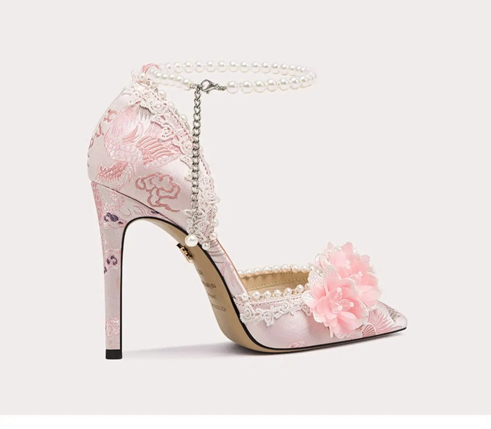 Waterproof pink embroidered bridal pump displayed for a spring celebration looks on a light background