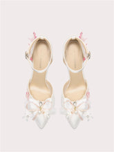 White bow pearl stiletto heels with silk butterfly-knot and floral accents