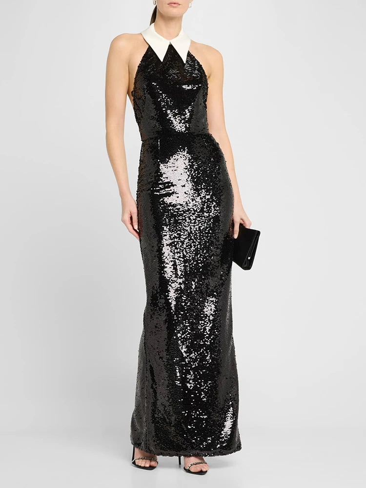 White collar black sequin formal dress shown for modern occasions  worn by a model on a white background