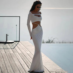 White slash neck cut-out maxi dress on dock by water