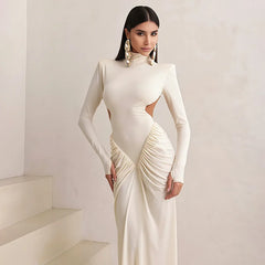 White cutout turtleneck knit gown designed for winter parties