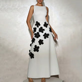 White embroidered maxi dress with black 3D floral details for parties