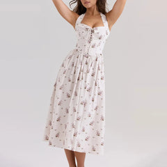 White floral midi dress with lace-up front and square neckline on the model on a light gray background