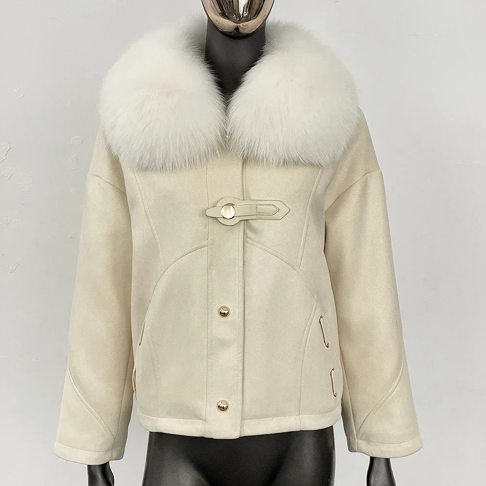 Close-up of the white fox fur collar on a beige winter coat.