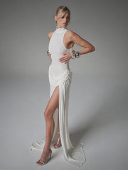 White high slit turtleneck gown styled for sleek evening events