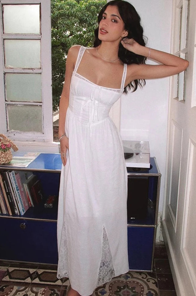 White lace beach maxi dress styled for romantic summer vacations