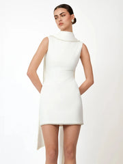 Close-up of the round neckline with delicate beading, showing the clean sleeveless cut and smooth, sculpted fit through the bodice.