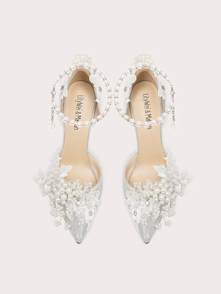 White pearl blossom bridal heels styled for weddings and ceremonies