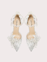 White pearl blossom bridal heels styled for weddings and ceremonies