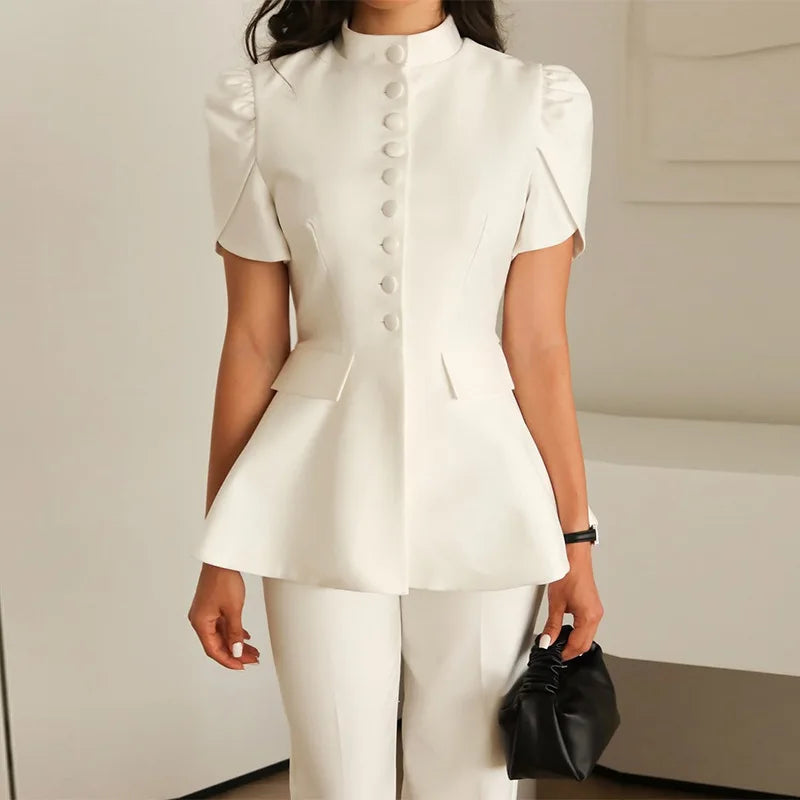 White peplum puff sleeve blouse styled for minimalist modern office looks