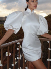 White puff sleeve mini sheath dress styled for office and autumn statement looks