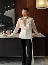 Sheer-effect deep V blouse with long sleeves and a relaxed silhouette