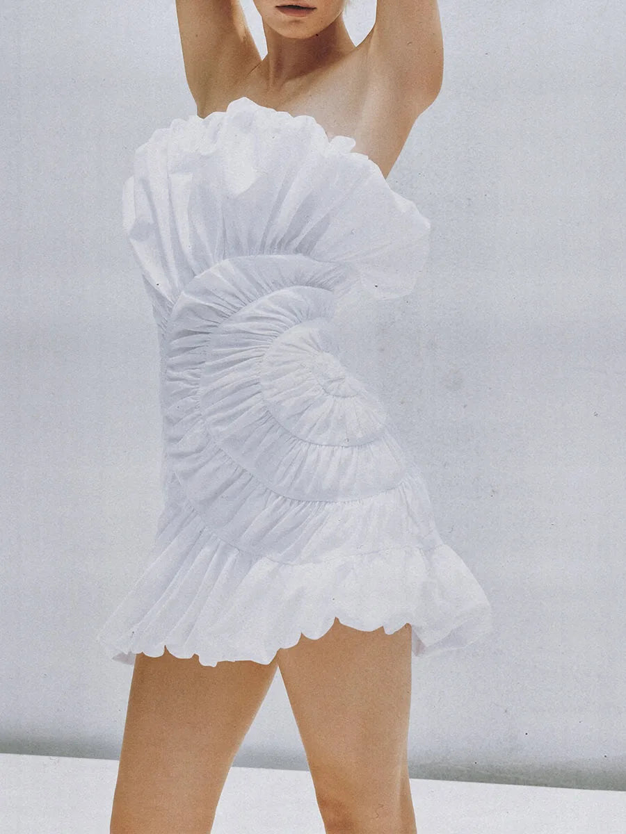 White strapless mini dress with sculptural shell folds