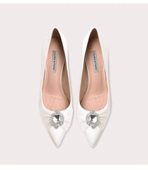 White silk crystal bow pumps styled for brides and formal occasions