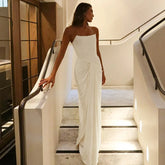 White strapless backless gown styled for elegant formal evenings