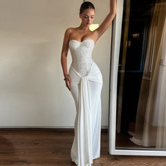 White strapless sequin gown styled for formal evening occasions