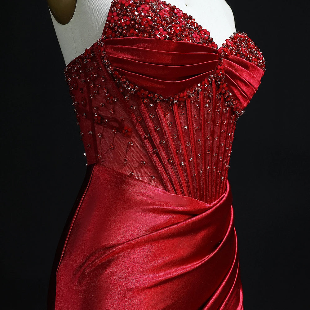 Close-up of crystal detailing on sweetheart bodice of satin gown