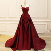 Sweetheart A-line evening gown with draped bodice on a mannequin