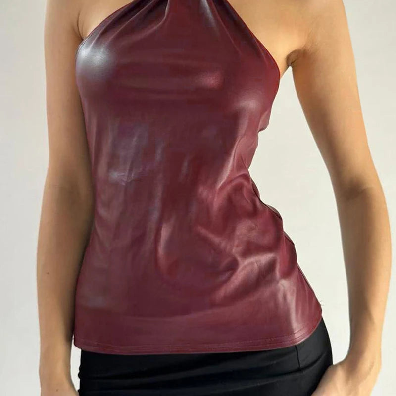 A slim club party camisole styled with a mini skirt.