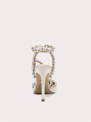 Close-up of silk and rhinestone bridal sandals